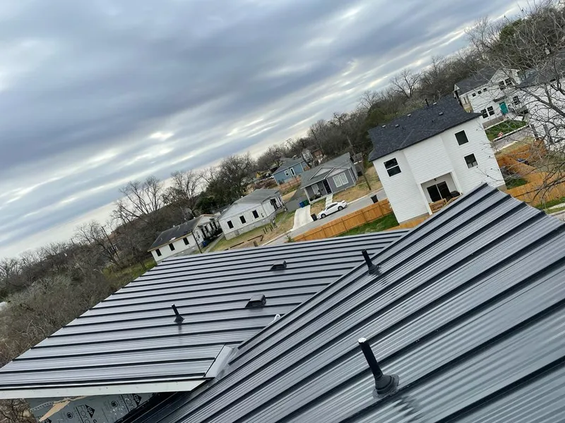 Standing seam metal roof panels with vents for Skylight Repair in Oak Grove
